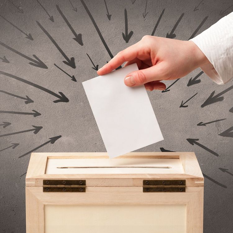 close up of a ballot box and casting vote
